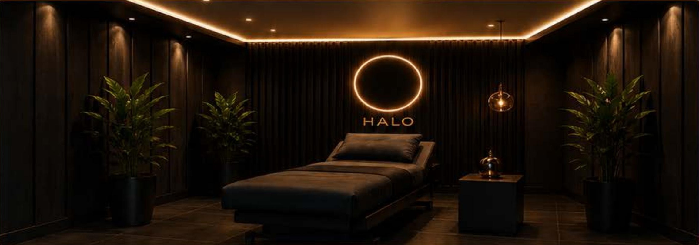Halo wellness room with illuminated halo ring, warm indirect lighting and premium recliner